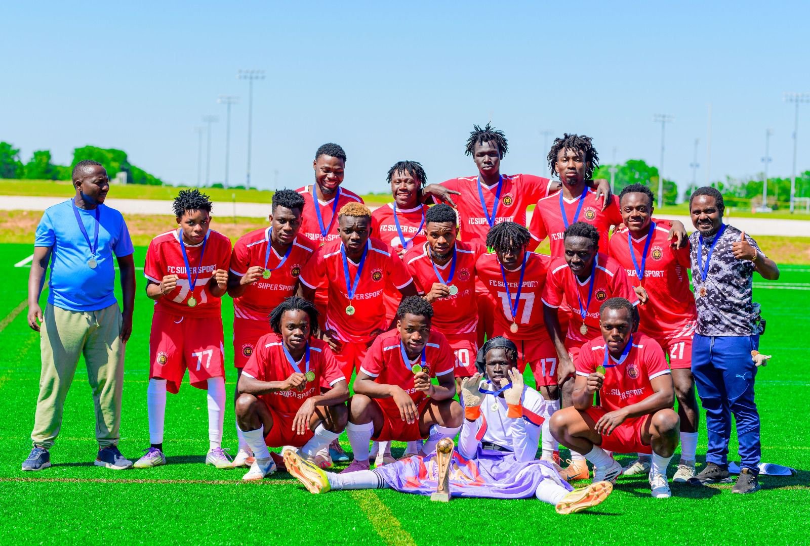 FC Super Sport players celebrating the 2026 Spring Cup championship with the trophy