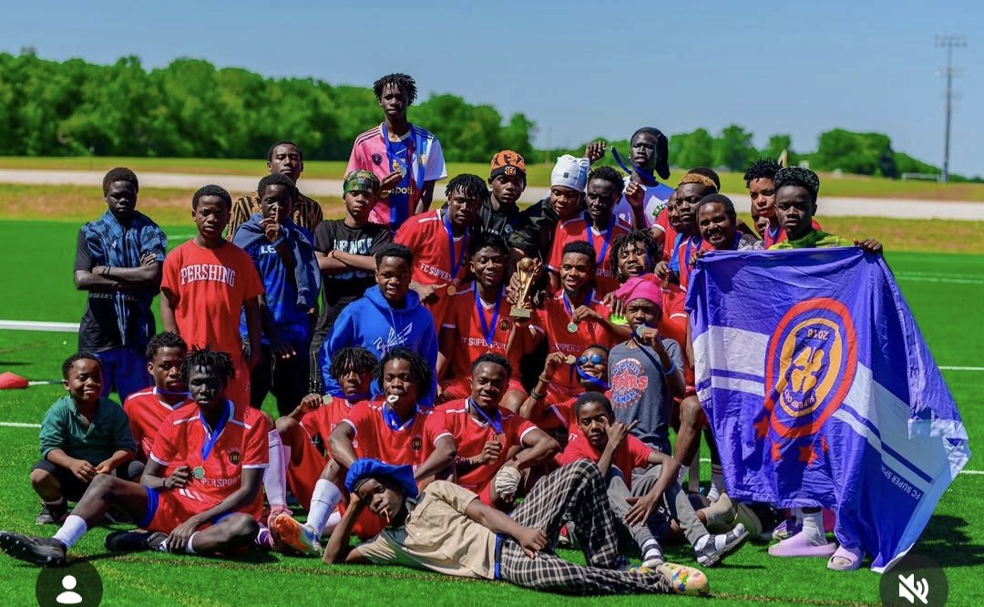 FC Super Sport team celebrating with the championship trophy
